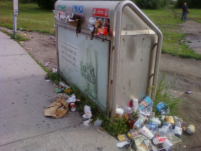 Garbage receptacle in Toronto overflowing